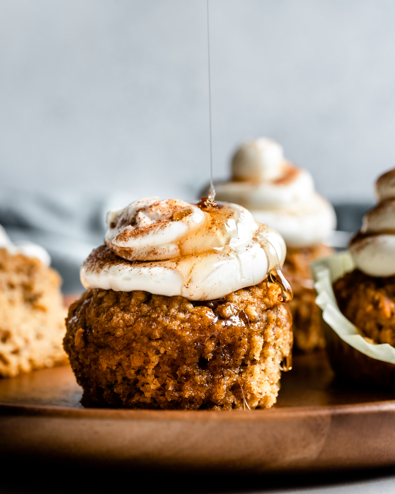 Syrup drizzling on frosted muffin